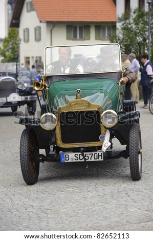 LANDSBERG, GERMANY - JULY 9: Oldtimer rally for at least 80 years old antique cars with Brennabor, built at year 1910, photo taken on July 9, 2011 in Landsberg, Germany