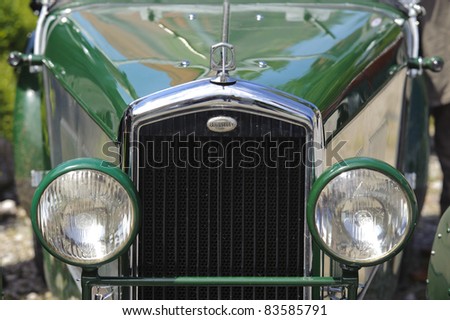 LANDSBERG, GERMANY - JULY 9: Oldtimer rally for at least 80 years old antique cars with Wolseley Hornet, built at year 1927, photo taken on July 9, 2011 in Landsberg, Germany