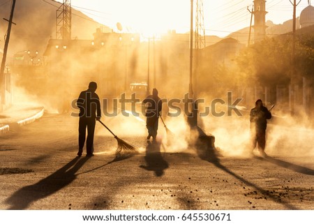 Similar – Image, Stock Photo Road worker cleaning city street with high pressure power washer, cleaning dirty public transport stops, Moscow, Russia