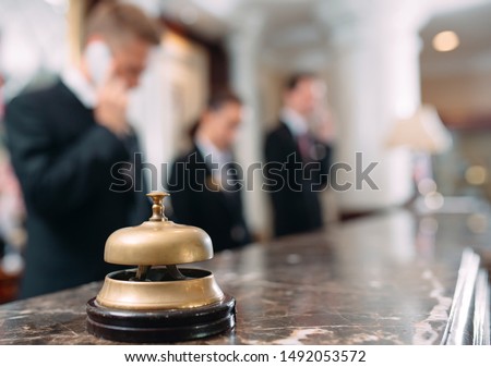 Hotel service bell Concept hotel, travel, room,Modern luxury hotel reception counter desk on background