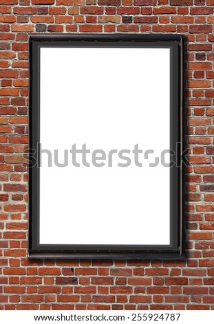 Blank billboard attached to a buildings red brick wall