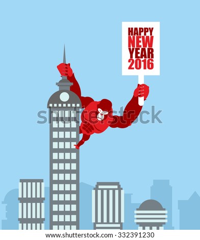 Monkey on skyscraper. King Kong holds a sign with new year. Huge strong Gorilla climbed up on municipal building. Animal from jungle in city.