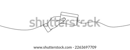 Hand holding credit card continuous line drawing.Hand with bank credit card one line drawing. Vector illustration