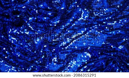Holiday and party banner. blue sequins background - abstract festive backdrop for Glamour shiny background with sequin texture and blinking lights. Foto d'archivio © 
