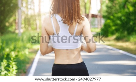 Similar – Image, Stock Photo Unrecognizable fit woman in swimsuit standing on sandy beach