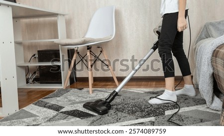 Similar – Image, Stock Photo Low section child with red rubber boots walking on puddle