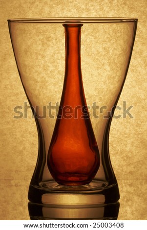 The red bottle in the vase