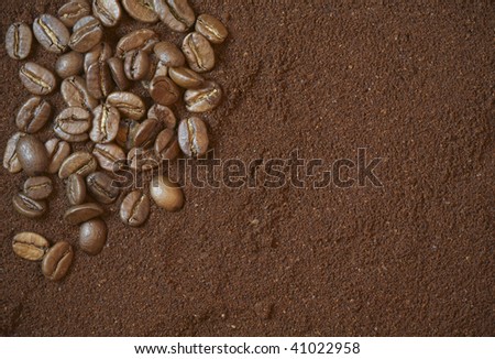 Background with coffee beans and ground coffee