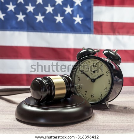 Gavel and Alarm Clock, American flag background