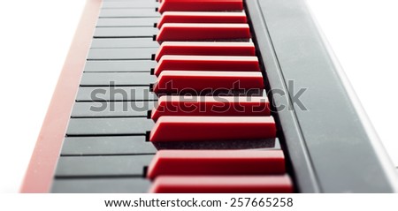 Midi keyboard red black top and bottom blur abstract background