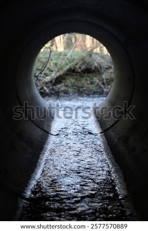 Similar – Image, Stock Photo View through a circular recess of a soccer goal to the opposite goal.