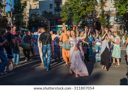 UKRAINE. KIEV - JULY 18, 2015: Krishnaites dancing on Khreshchatyk street, Kreshatik street