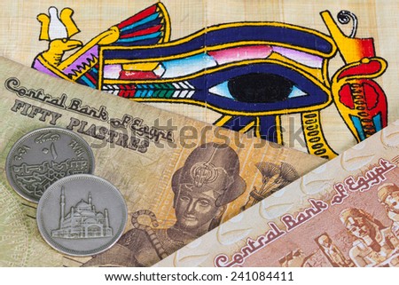 Typical Egyptian hieroglyphics on papyrus and different banknotes