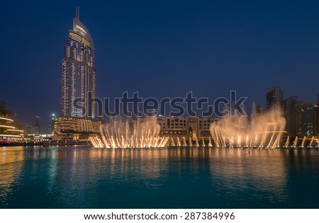 Dubai - Jun 4: The Dubai Fountain on June 4, 2015 in Dubai. The Dubai Fountain is a dancing fountain show next to the Dubai Mall and Burj Khalifa.