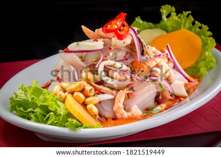 The Peruvian mixed ceviche is a traditional dish. It is different because it uses lemon, fish, octopus, snail, shrimp, shells, squid, potatoes, onion, seaweed, corn, chili, ginger, milk, sweet potato