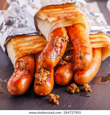 Hot Dog grilled with mustard and ketchup