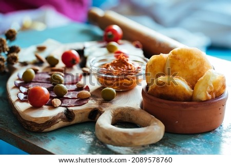 Similar – Image, Stock Photo Breakfast with egg, meat jamon, spinach and bread on terrace wooden table. Delicious homemade breakfast on balcony.