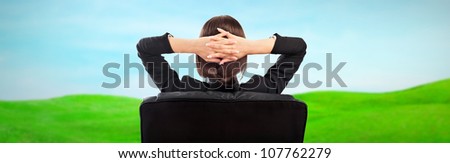 Closeup portrait of cute young business woman from behind dreaming, resting and imagine idyllic view