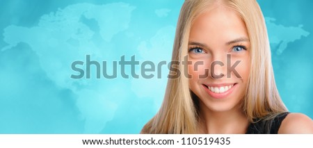Young beautiful woman standing against worldmap background. International education, business or transportation concept