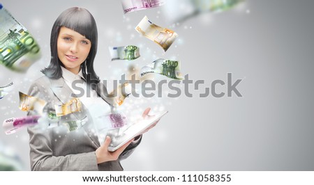 Portrait of a happy brunette woman with tablet computer - money