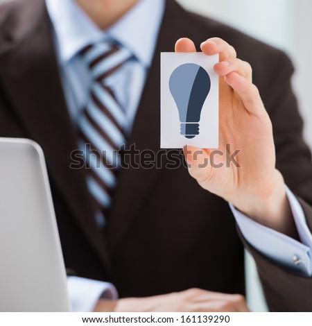 Similar – Image, Stock Photo Macro unknown hand giving terminal to visitor for mobile phone payment indoor. Client hand paying bill with smartphone in blurred background. Cropped shot hands making contactless transaction inside.