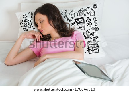 Young sleeping woman thinking of her plans sketches around her on pillow