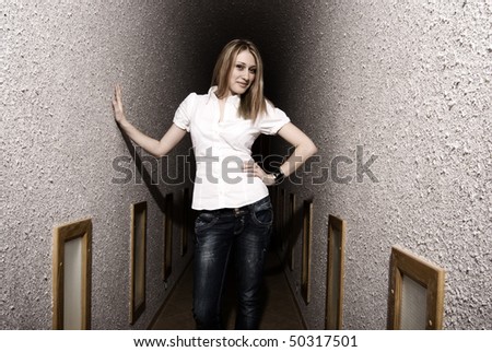 Young woman near wall  portrait
