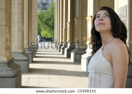 Young woman outdoors: at the famous Opera Theater Novosibirsk
