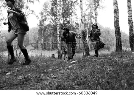 War episode. Russian officer and two girls running from fascist soldier