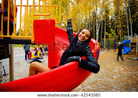 Young person on playground. Playing the Ape. Fake kids.