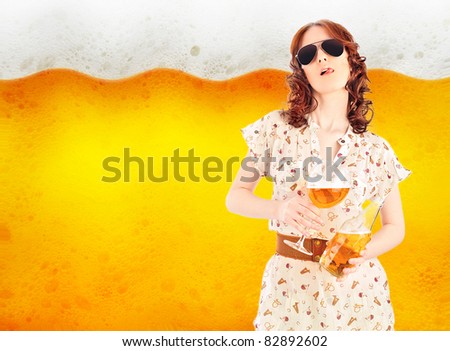 Bright poster of hot sexy woman holding glass and bottle full of beer licks her lips. Close up of beer bubbles on the background. Advertisement banner with copyspace