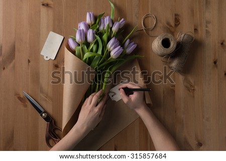 Process of making Tulip Bouquet. Photo from above the table