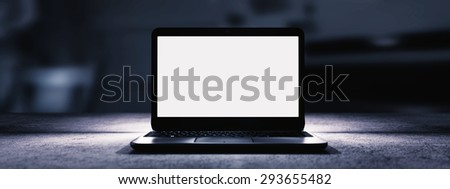 Laptop with empty screen and stylish backlight. Image easy to crop to achieve space for text on right or left.