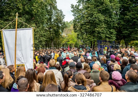 POLTAVA, UKRAINE - 14 OCTOBER 2015: local residents and members of the volunteer battalions celebrate day of defenders of Ukraine and establishment of monument for famous hetman Ivan Mazepa
