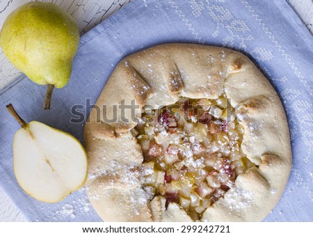 Apple pear galette. A galette is a rustic, free-form tart that is cooked on a baking sheet and can be prepared with a variety of seasonal fruits.