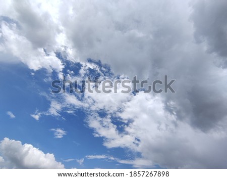 Similar – Image, Stock Photo Fair weather clouds in front of a blue sky and a small section of a red tiled roof with a parabolic antenna / satellite dish / football transmission