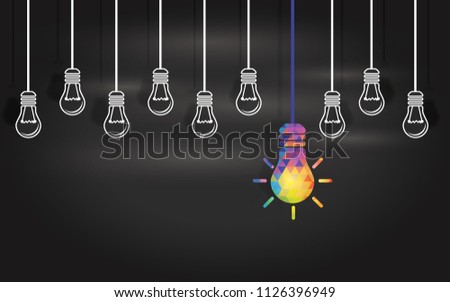 Light bulbs on a blackboard background. Human resources concept, recruiting eople with new ideas, thinking outside the box. Strategy and leadership. Planning and organization in new business.