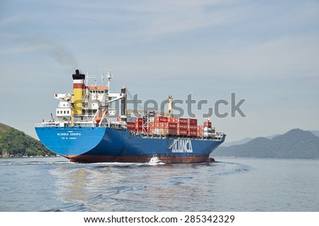 SAO PAULO, BRAZIL - January 27: Maritime transport ship leaving the port of Santos, located in the cities of Santos and Guaruja, State of Sao Paulo is the main Brazilian port, on January 27, 2015.