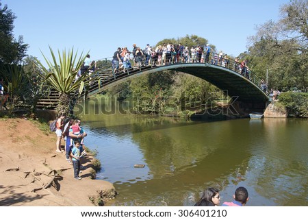SAO PAULO, BRAZIL - August 2: Families and people in the Ibirapuera Park in late sunny week, the largest park in the city of Sao Paulo, on August 2, 2015.