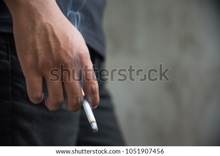 Similar – Image, Stock Photo Black man smoking in studio with neon illumination