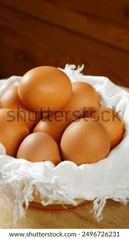 Image, Stock Photo Brown eggs and baking ingredients on a kitchen table. Rustic style.