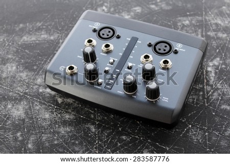 Audio interface for recording or mixing - sound/audio card - grunge background