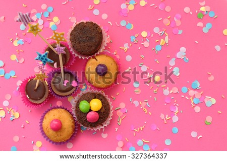 Cupcakes on pink confetti background  - happy birthday card