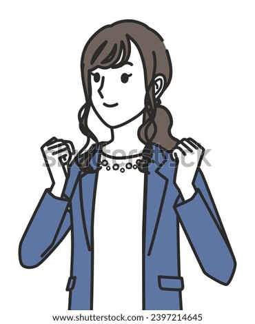 A woman in office casual outfit with a fist pump