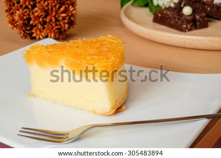 Gold Egg Yolks Thread cake on white dish, Selective focus
