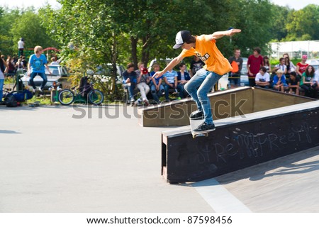 PETROZAVODSK, RUSSIA - JULY 13: An unidentified stakeboarder performs skatebording stunts during an extreme sports festival on July 13, 2011 in Petrozavodsk Russia.