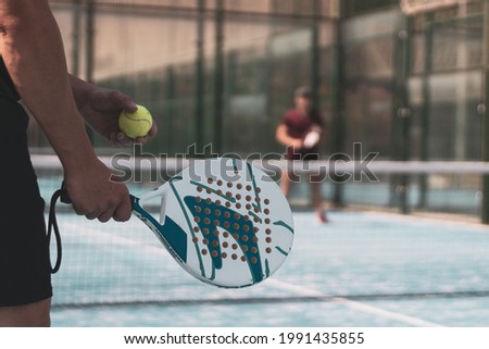 Similar – Image, Stock Photo Paddle tennis player with surgery mask