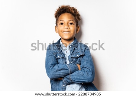 Similar – Image, Stock Photo Cheerful little boy with dumbbells