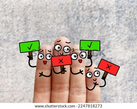 Four fingers are decorated as four person. Some of them agree and some do not agree with the movement.