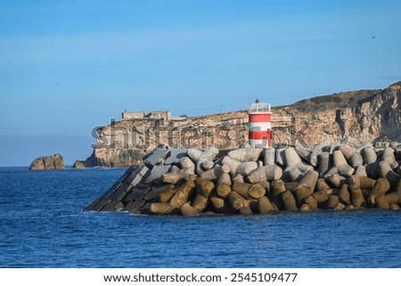 Similar – Image, Stock Photo An imposing landscape of rugged mountains and fields that extend to the horizon